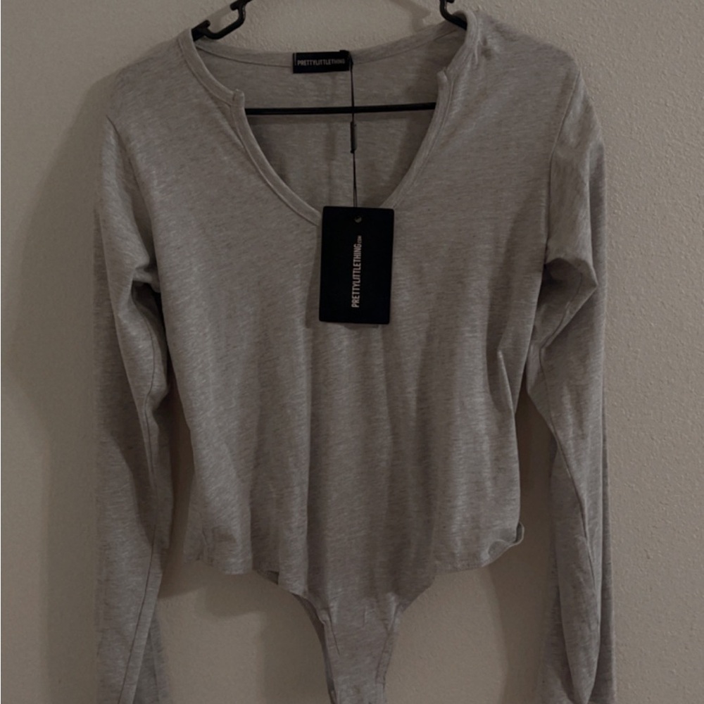 NWT Pretty Little Thing bodysuit size medium / large